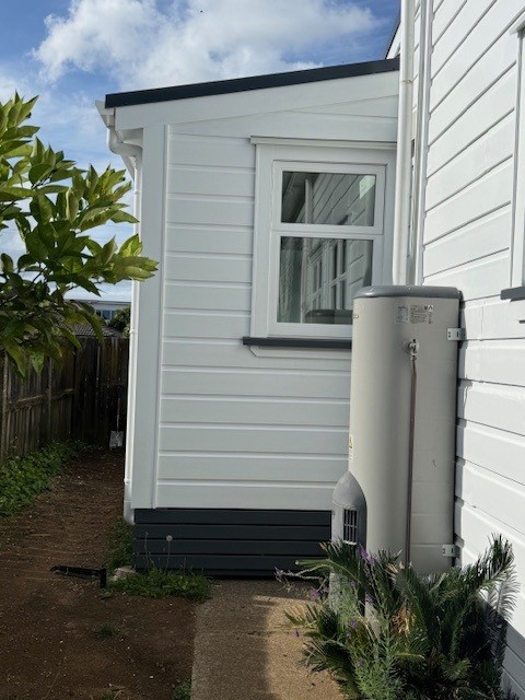 Completed weatherboard laundry extension in Onehunga